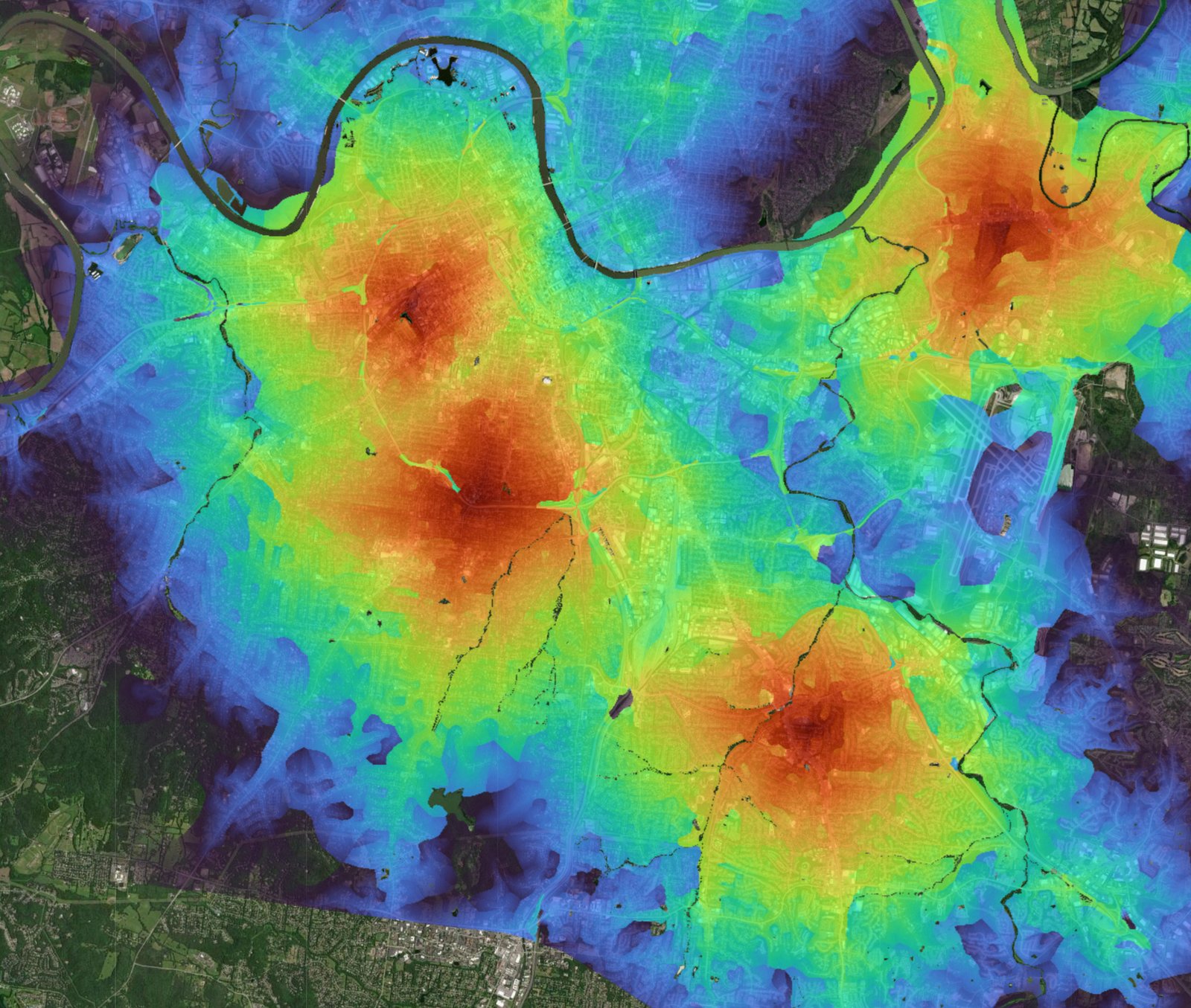 Geographic analysis with a multicolored heat map over satellite imagery.